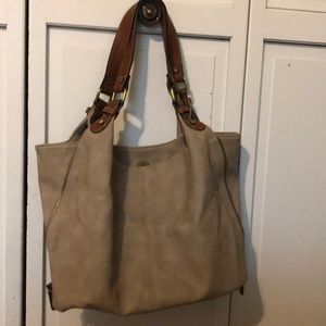 Nude medium sized purse